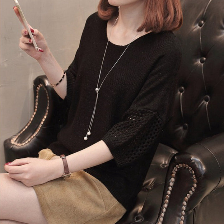 Pull en tricot pour femmes avec des manches aérées et un motif de crochet moderne Chic & Stil