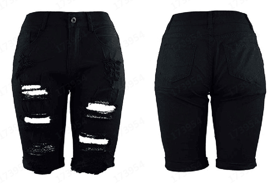Women's destroyed denim trousers with a casual cut and trendy tear details Lune London