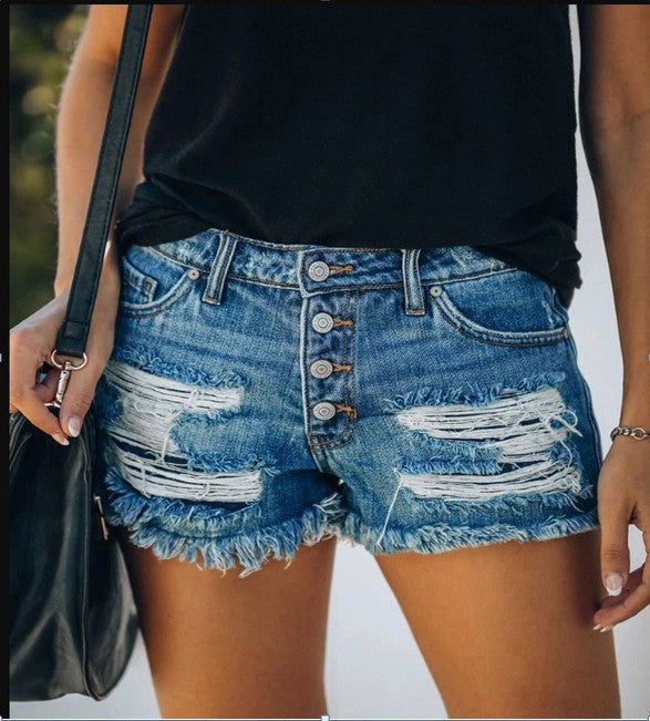Women's casual destroyed denim shorts with button placket and frayed hem Lune London