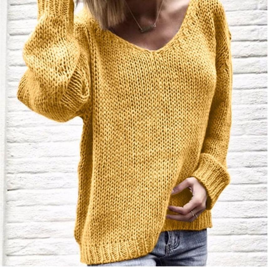 Casual knit sweater for women with deep V-neck and side slits Lune London