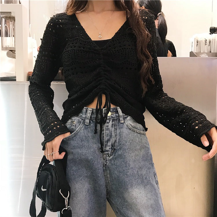 Knit sweater for women with a decorative hole pattern and an adjustable drawstring Lune London