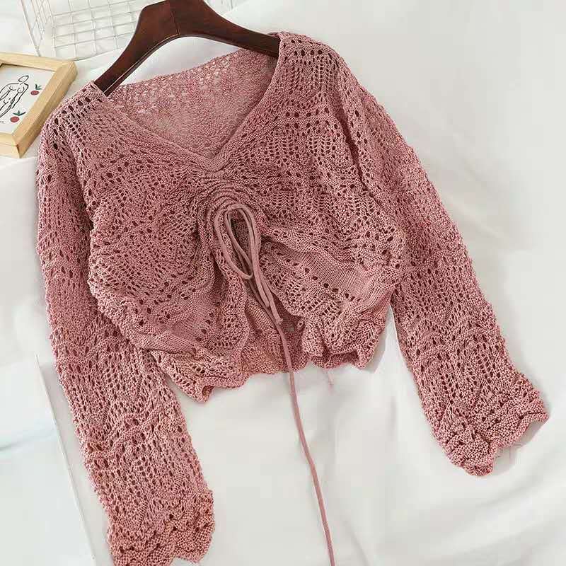 Knit sweater for women with a decorative hole pattern and an adjustable drawstring Lune London