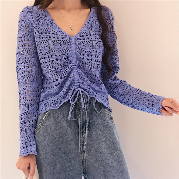 Knit sweater for women with a decorative hole pattern and an adjustable drawstring Lune London