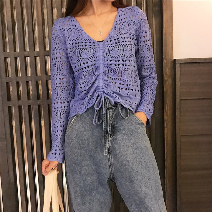 Knit sweater for women with a decorative hole pattern and an adjustable drawstring Lune London