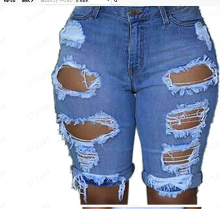 Women's destroyed denim trousers with a casual cut and trendy tear details Lune London