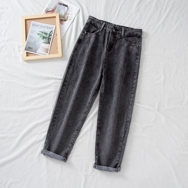 Women's high-waisted jeans in classic mom style with turned-up hems