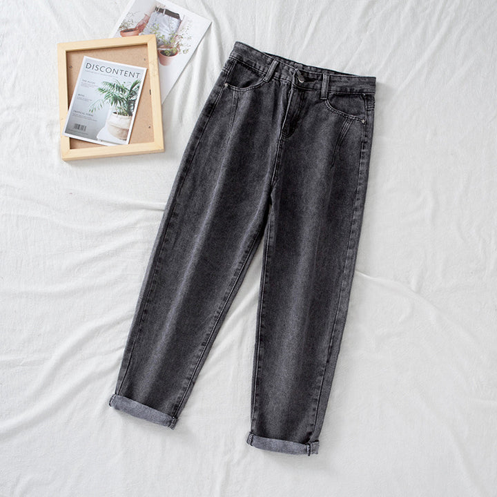 Women's high-waisted jeans in classic mom style with turned-up hems