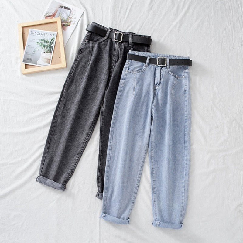 Women's high-waisted jeans in classic mom style with turned-up hems