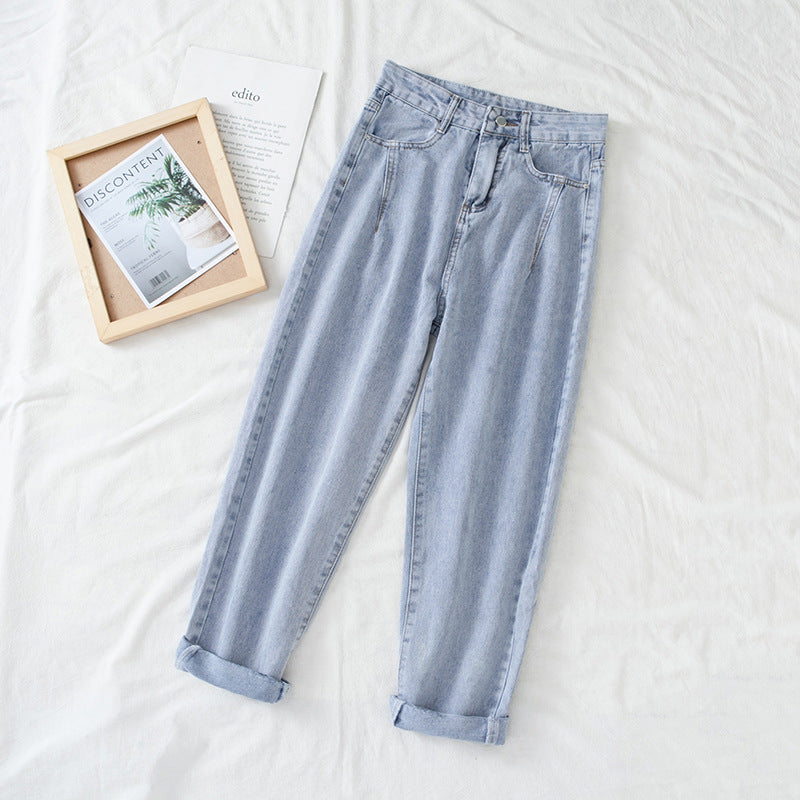 Women's high-waisted jeans in classic mom style with turned-up hems