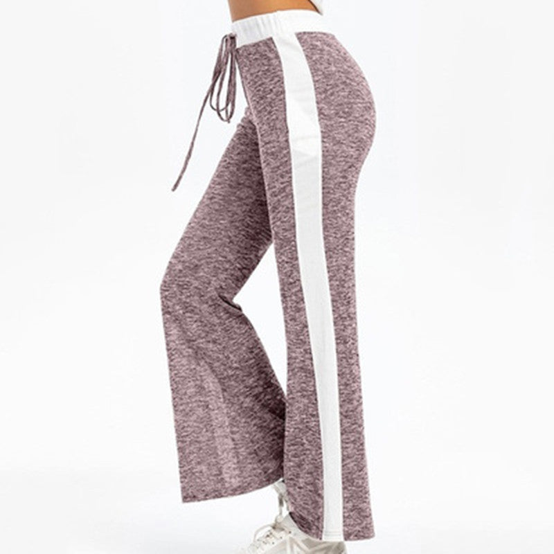 Fluid sports pants for women with side stripes and elastic waist Lune London