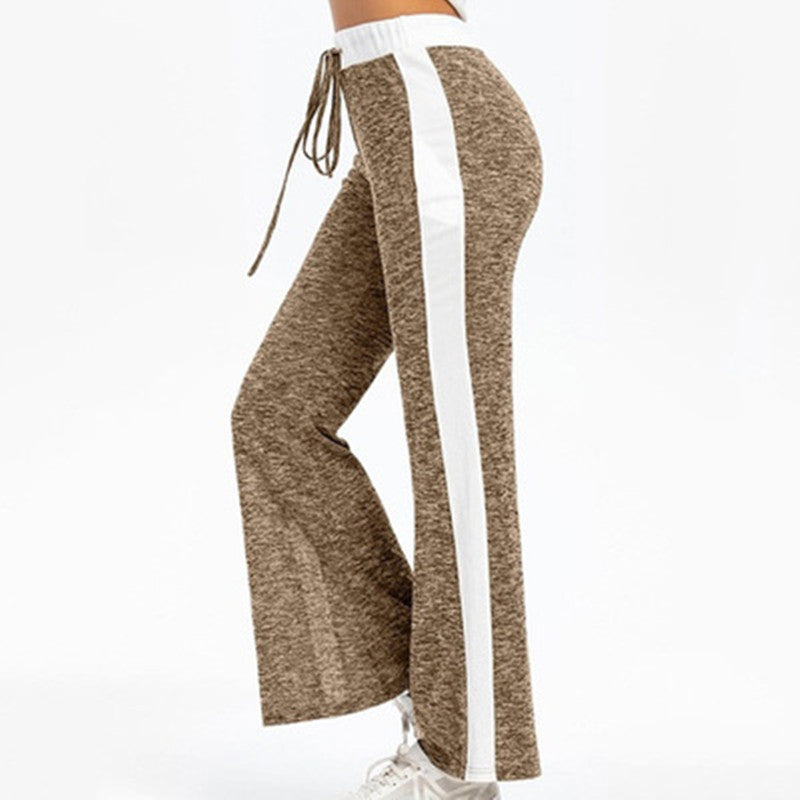 Fluid sports pants for women with side stripes and elastic waist Lune London
