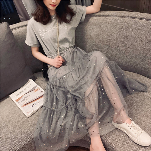 Women's long dress with decorative tulle layers and elastic waistband