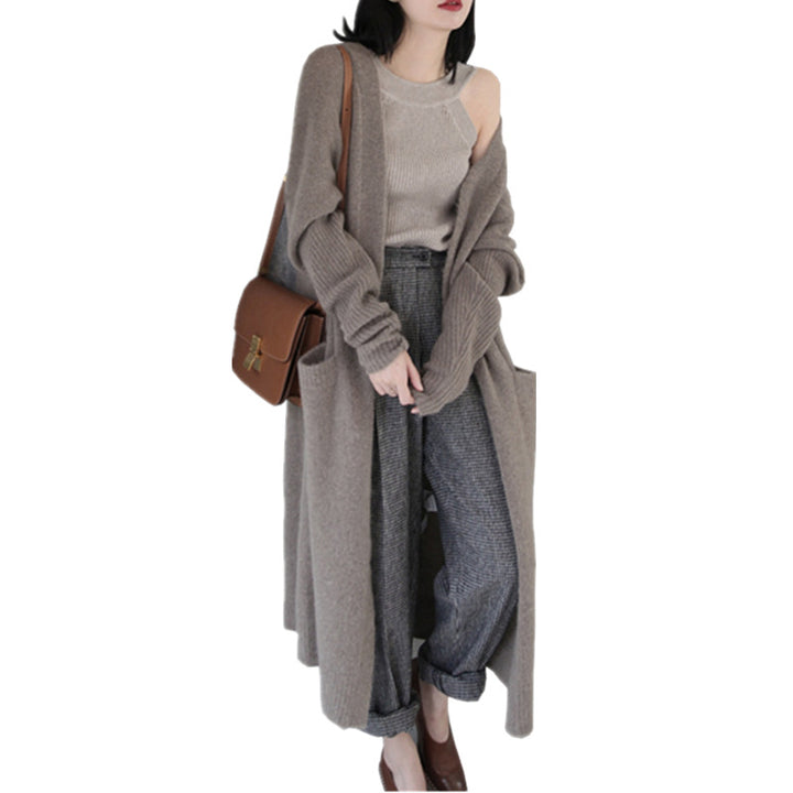 Cardigan long pour femmes en tricot avec design de poche pratique et matériau doux Chic & Stil
