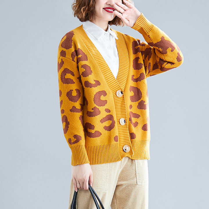 Ladies chunky knit cardigan with a striking leopard print and large button details Lune London