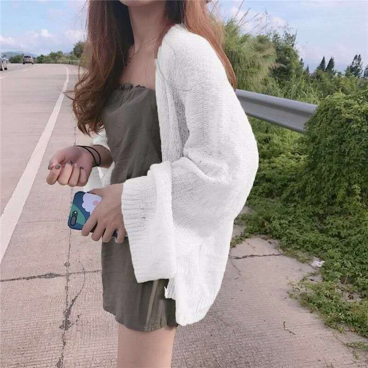 Casual knitted cardigan for women with a loose fit and open sleeves Lune Londonl
