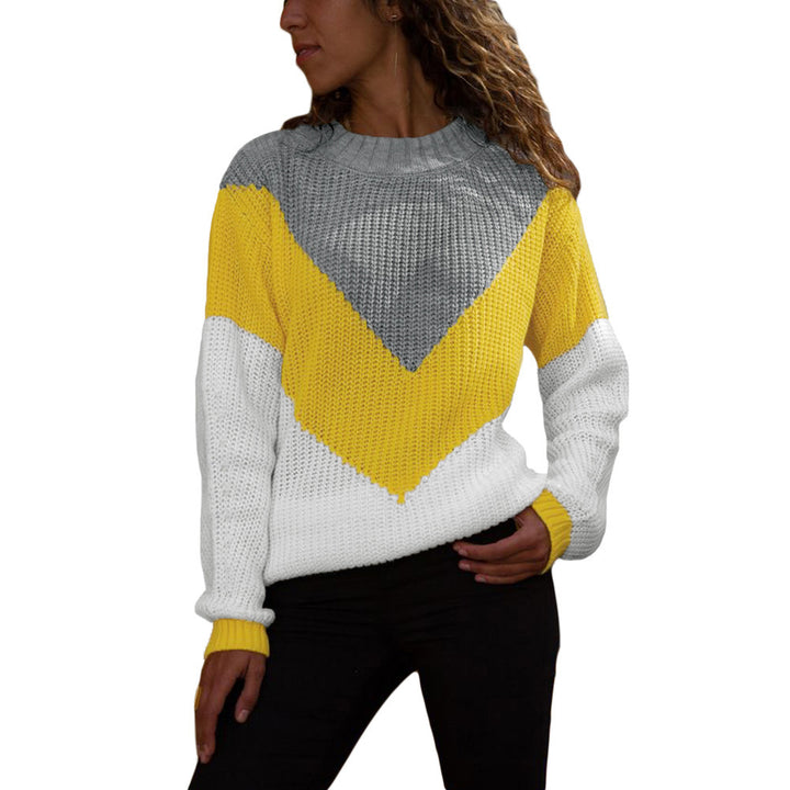 Women's thick knit sweater with a modern V-neck and a chic color block design