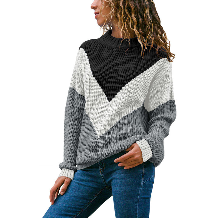 Women's thick knit sweater with a modern V-neck and a chic color block design