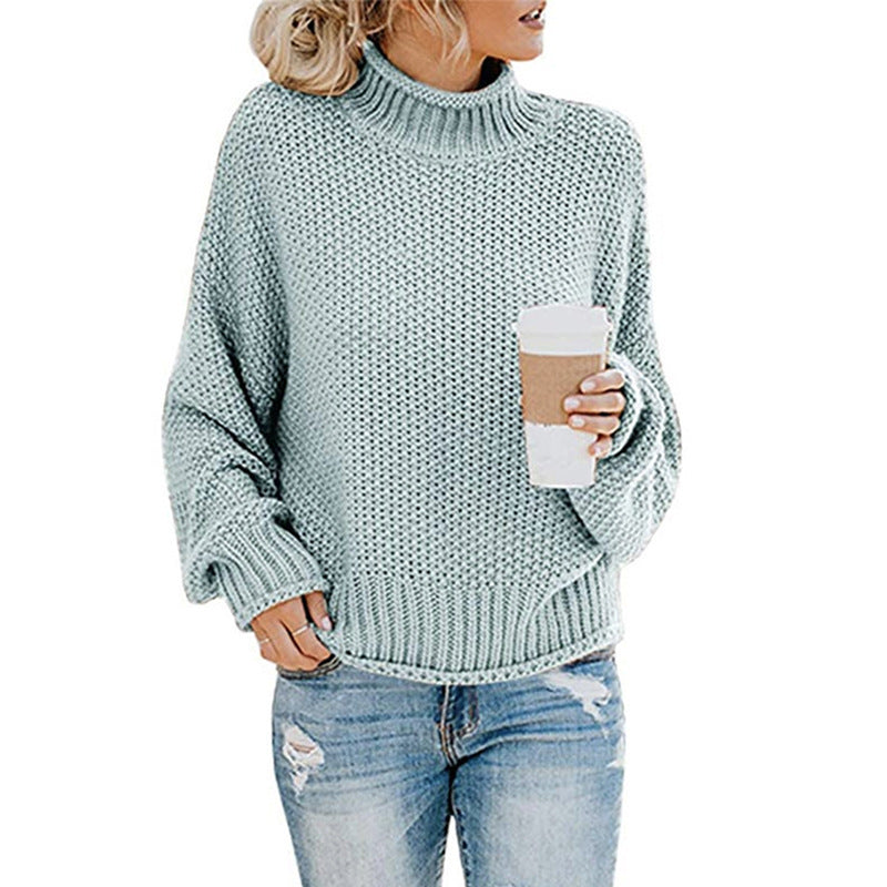Knitted sweater for women with high collar and loose fit Chic und Stil