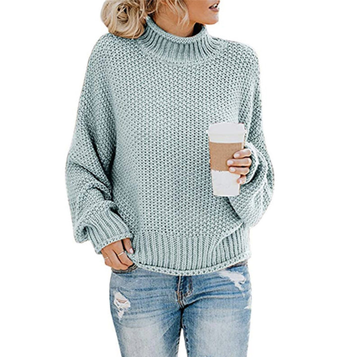 Knitted sweater for women with high collar and loose fit Chic und Stil