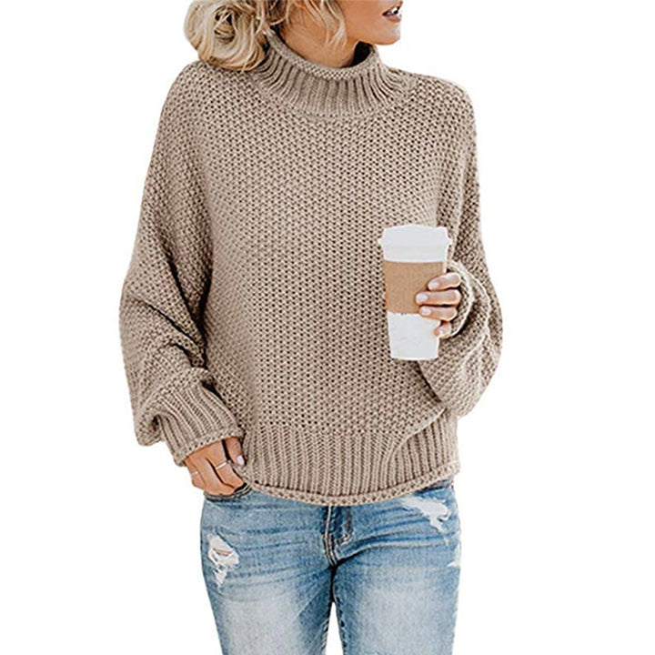 Knitted sweater for women with high collar and loose fit Chic und Stil