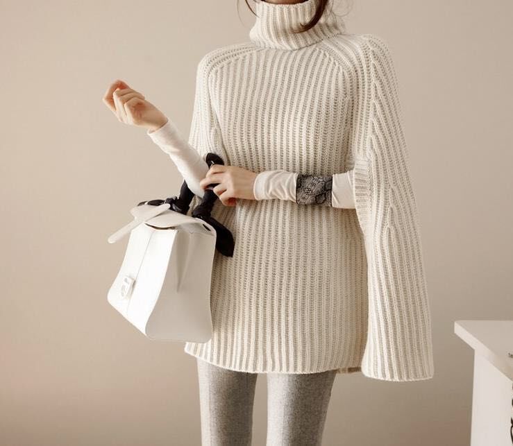 Oversized knitted sweater for women with high neck and textured design Lune London