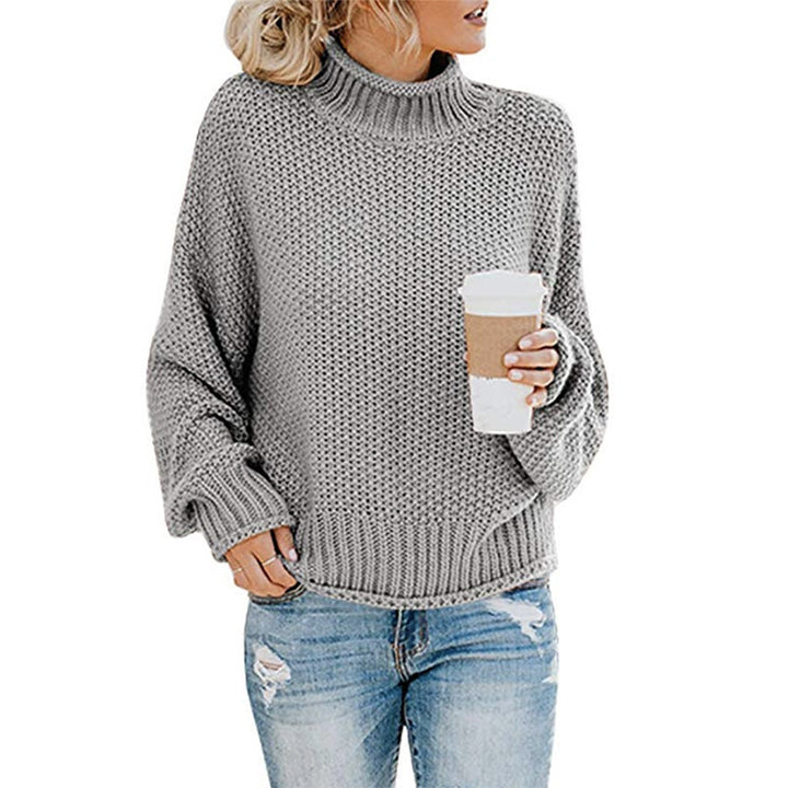 Knitted sweater for women with high collar and loose fit Chic und Stil