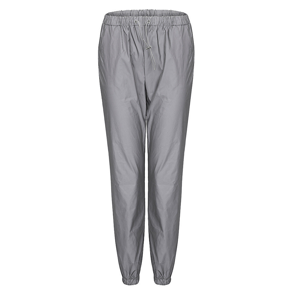 Light sports pants for women with elastic waist and practical side pockets Lune London
