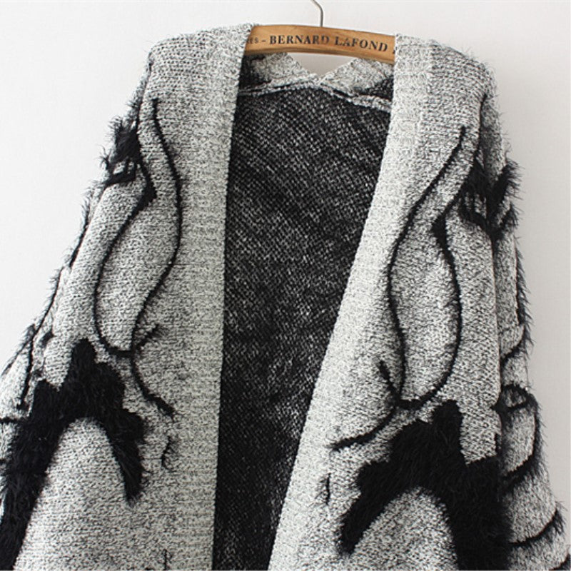 Knitted dress for women with artistic design and elegant silhouette Lune London