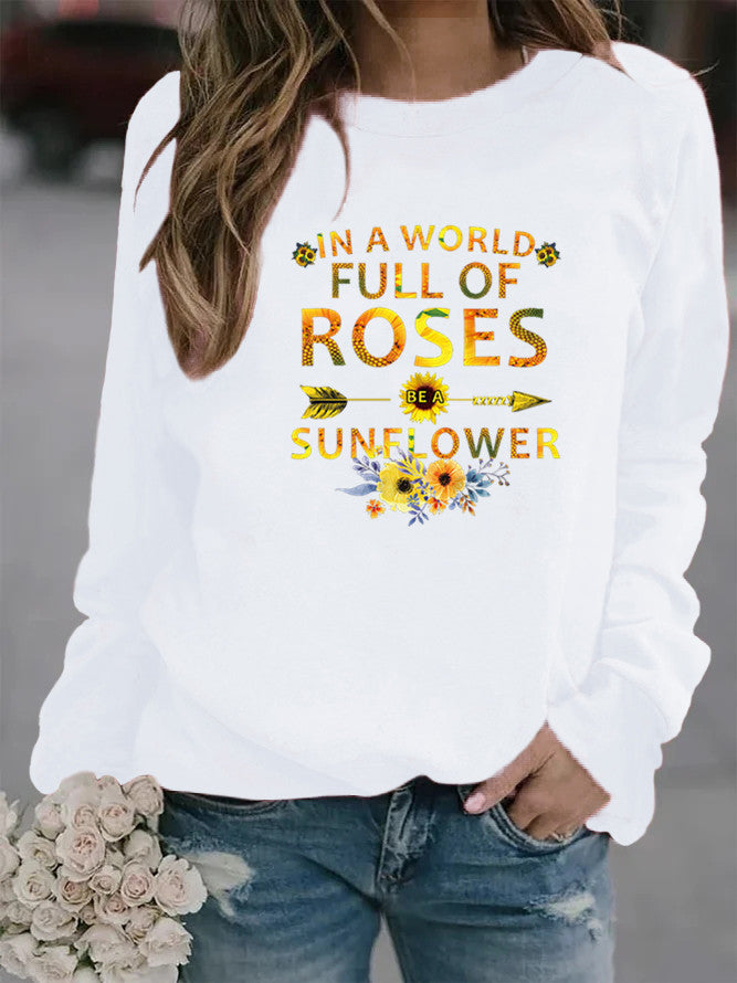 Sweat-shirt femme avec design inspirant et décoration florale Chic & Stil