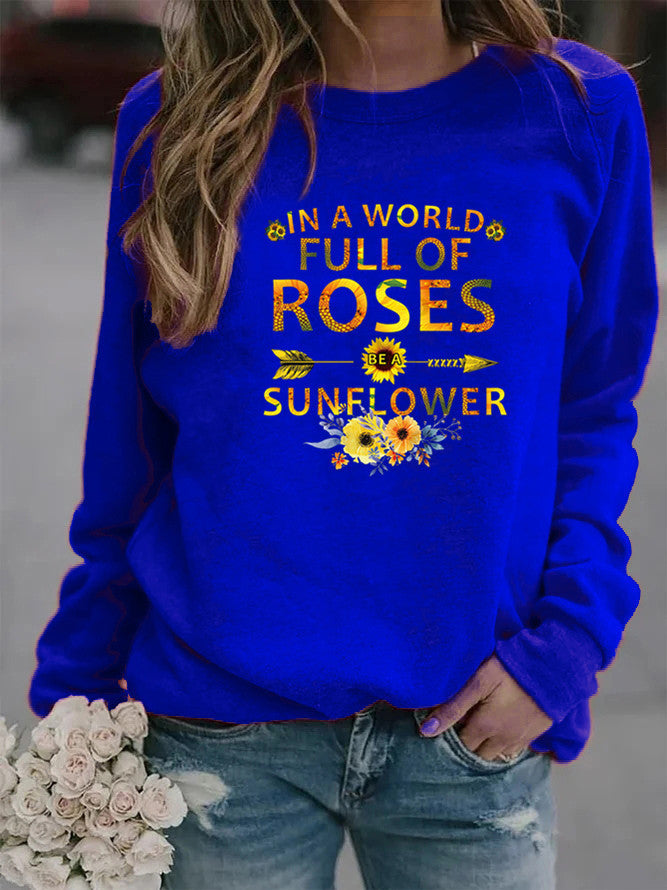 Sweat-shirt femme avec design inspirant et décoration florale Chic & Stil
