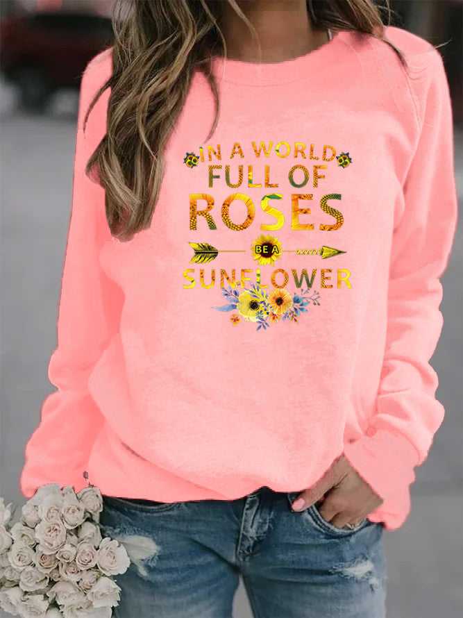 Sweat-shirt femme avec design inspirant et décoration florale Chic & Stil
