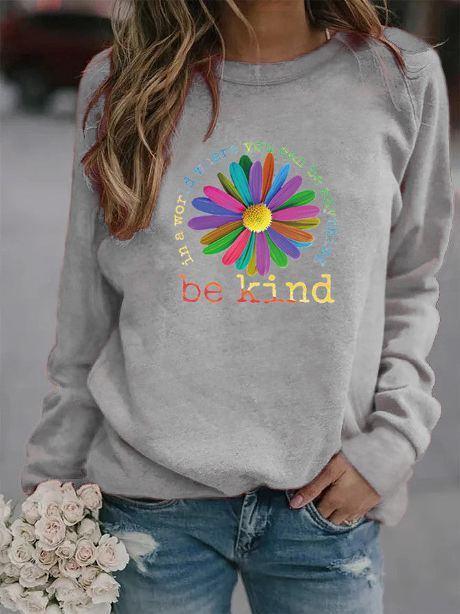 Sweatshirt pour femmes avec un design floral motivant coloré et un intérieur doux Chic & Stil