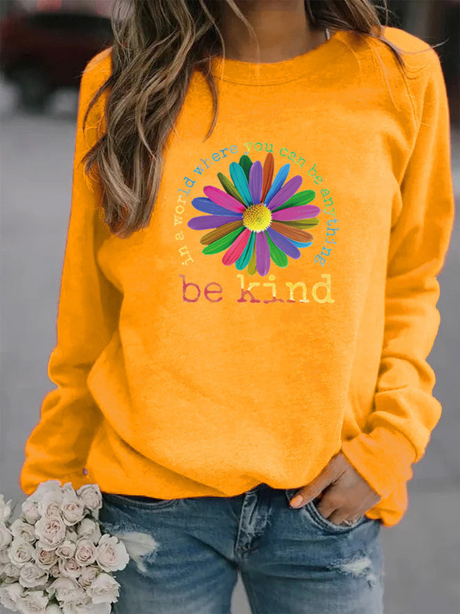 Sweatshirt pour femmes avec un design floral motivant coloré et un intérieur doux Chic & Stil
