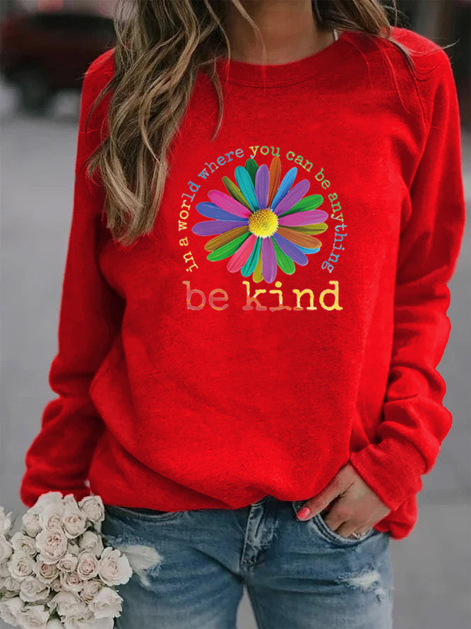Sweatshirt pour femmes avec un design floral motivant coloré et un intérieur doux Chic & Stil
