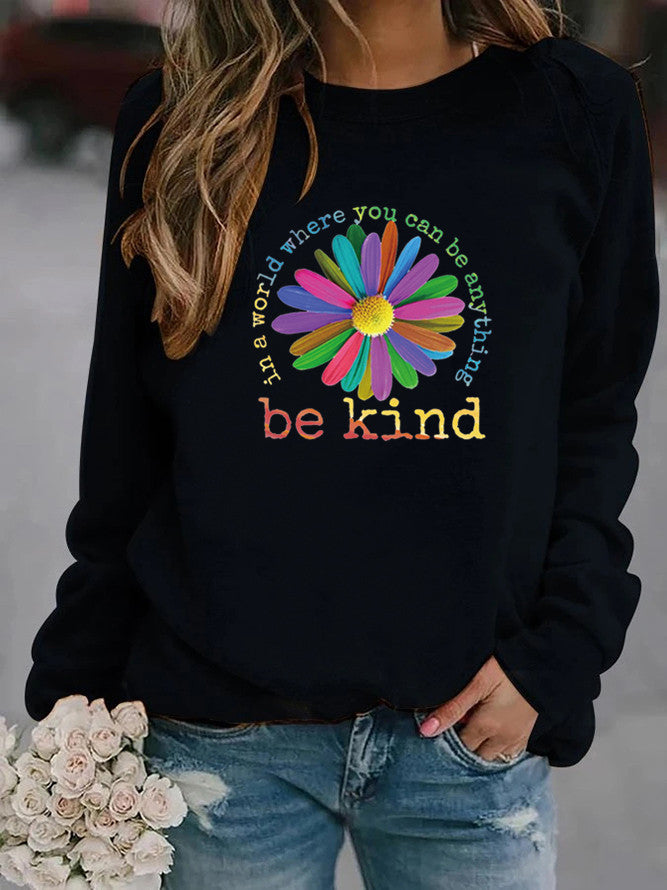 Sweatshirt pour femmes avec un design floral motivant coloré et un intérieur doux Chic & Stil