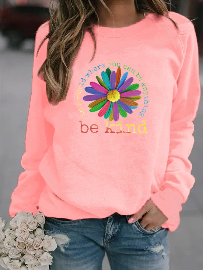 Sweatshirt pour femmes avec un design floral motivant coloré et un intérieur doux Chic & Stil