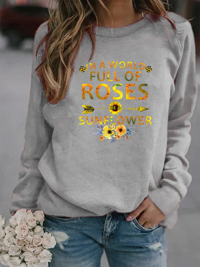 Sweat-shirt femme avec design inspirant et décoration florale Chic & Stil