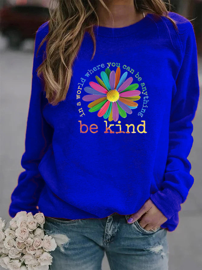 Sweatshirt pour femmes avec un design floral motivant coloré et un intérieur doux Chic & Stil