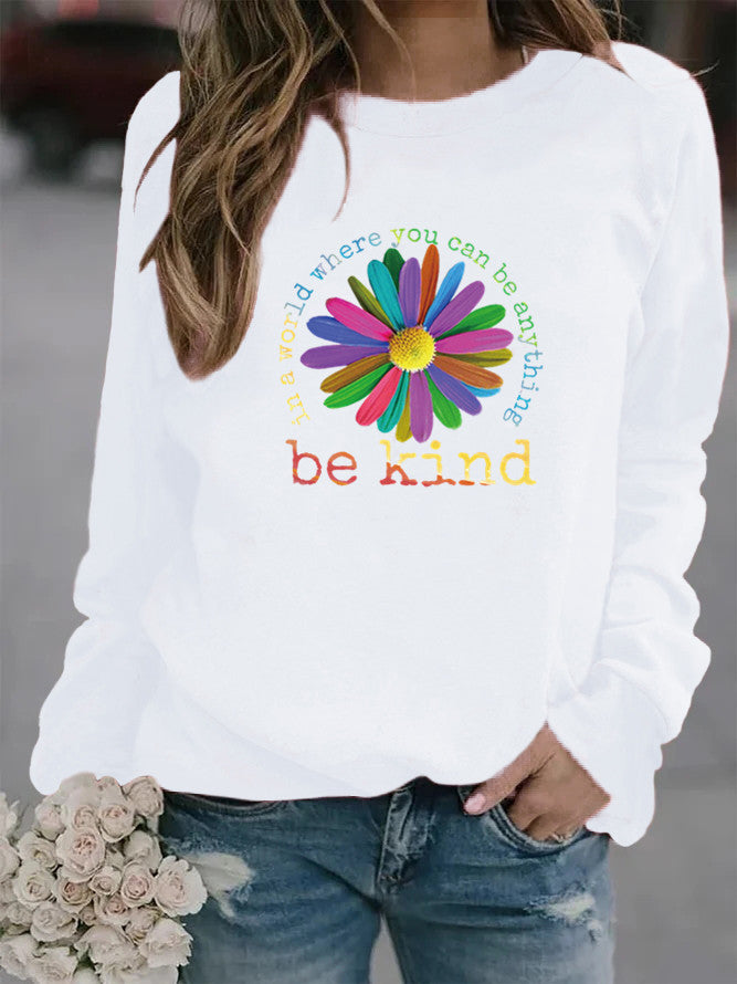 Sweatshirt pour femmes avec un design floral motivant coloré et un intérieur doux Chic & Stil