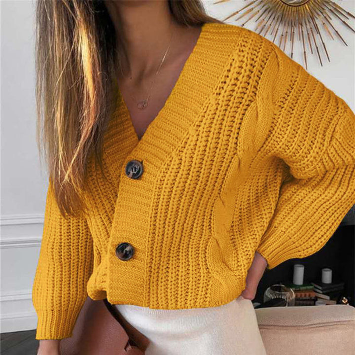 Ladies knitted cardigan with a beautiful cable pattern and stylish button details Lune London