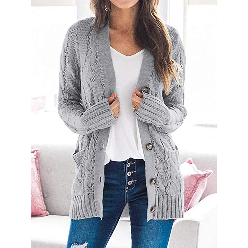 Women's knitted jacket with decorative cable pattern and practical pockets Lune London