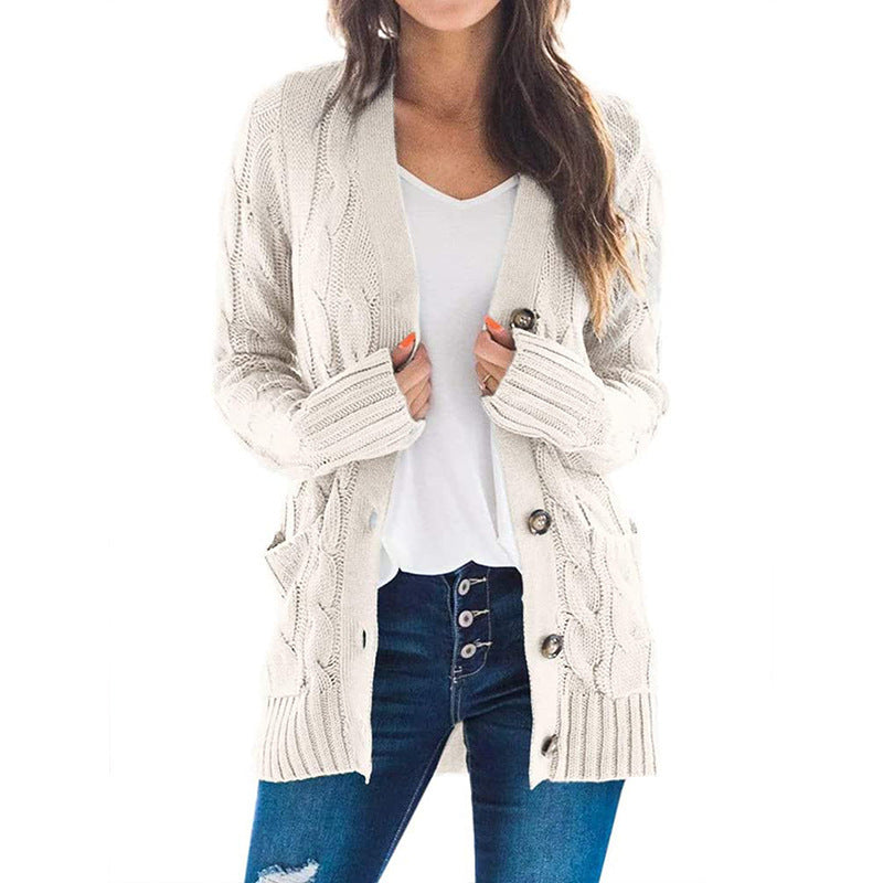 Women's knitted jacket with decorative cable pattern and practical pockets Lune London