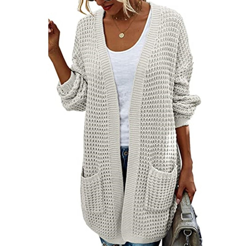 Ladies chunky knit cardigan with relaxed silhouette and open pockets Lune London