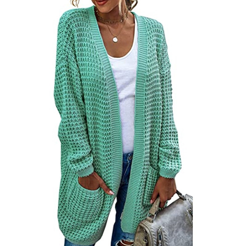 Thick knit cardigan for women with a relaxed fit and deep pockets Lune London