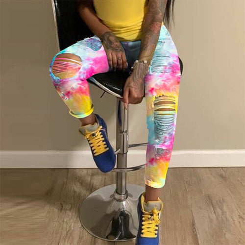 Skinny jeans for women with eye-catching tie-dye patterns and trendy distressed details Lune London