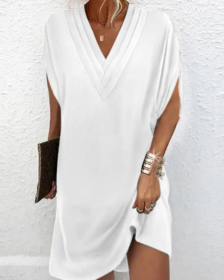 Chic und Stil | Elegant dress with slitted sleeves