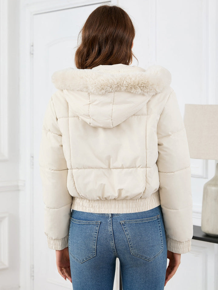 Chic und Stil | Cozy padded winter jacket with fur hood and pockets