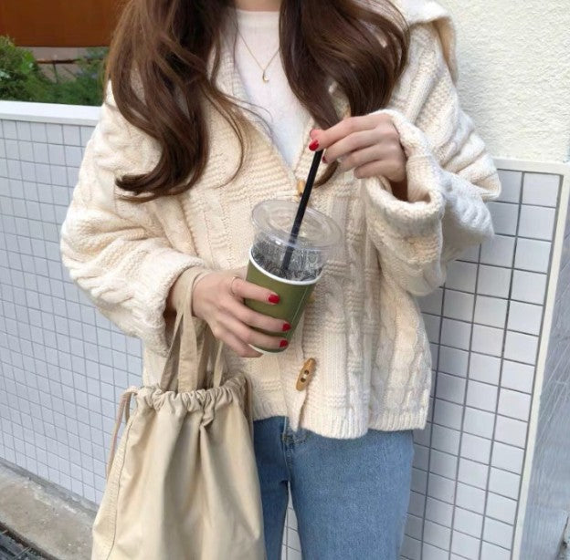 Women's cardigan with voluminous sleeves and a detailed cable pattern Lune London