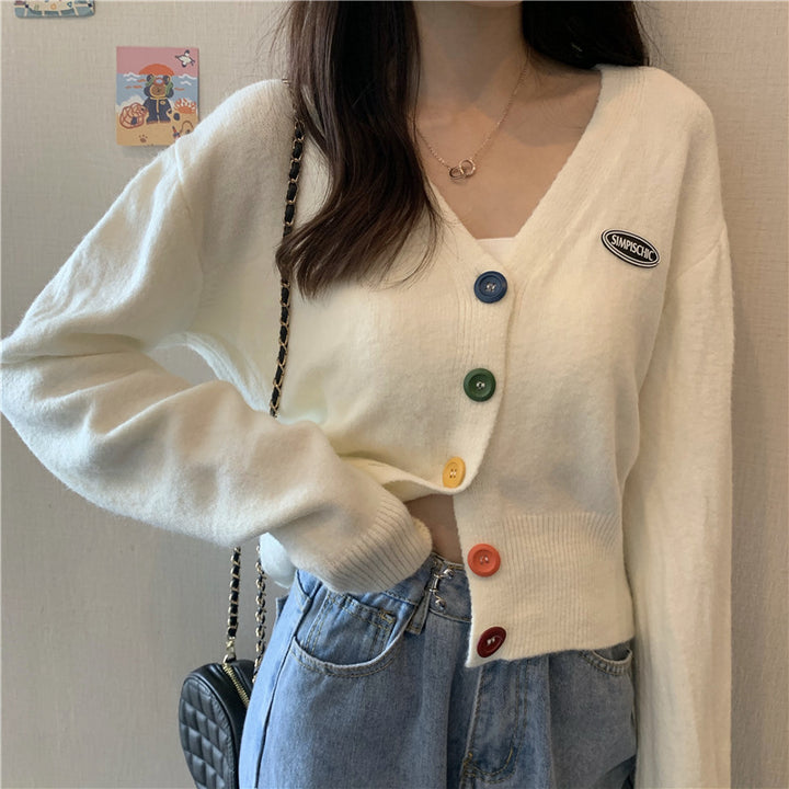 Gilet décontracté pour femmes avec des boutons colorés et col en V Chic & Stil