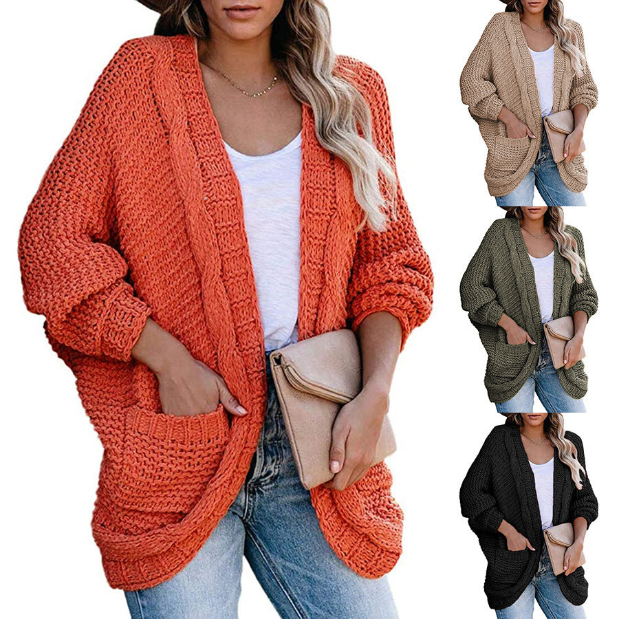 Ladies chunky knit cardigan with open sleeves and spacious pockets Lune London